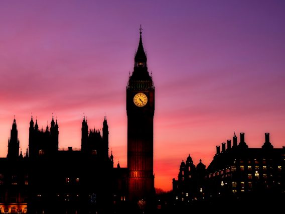 UK Parliament silhouette at dusk